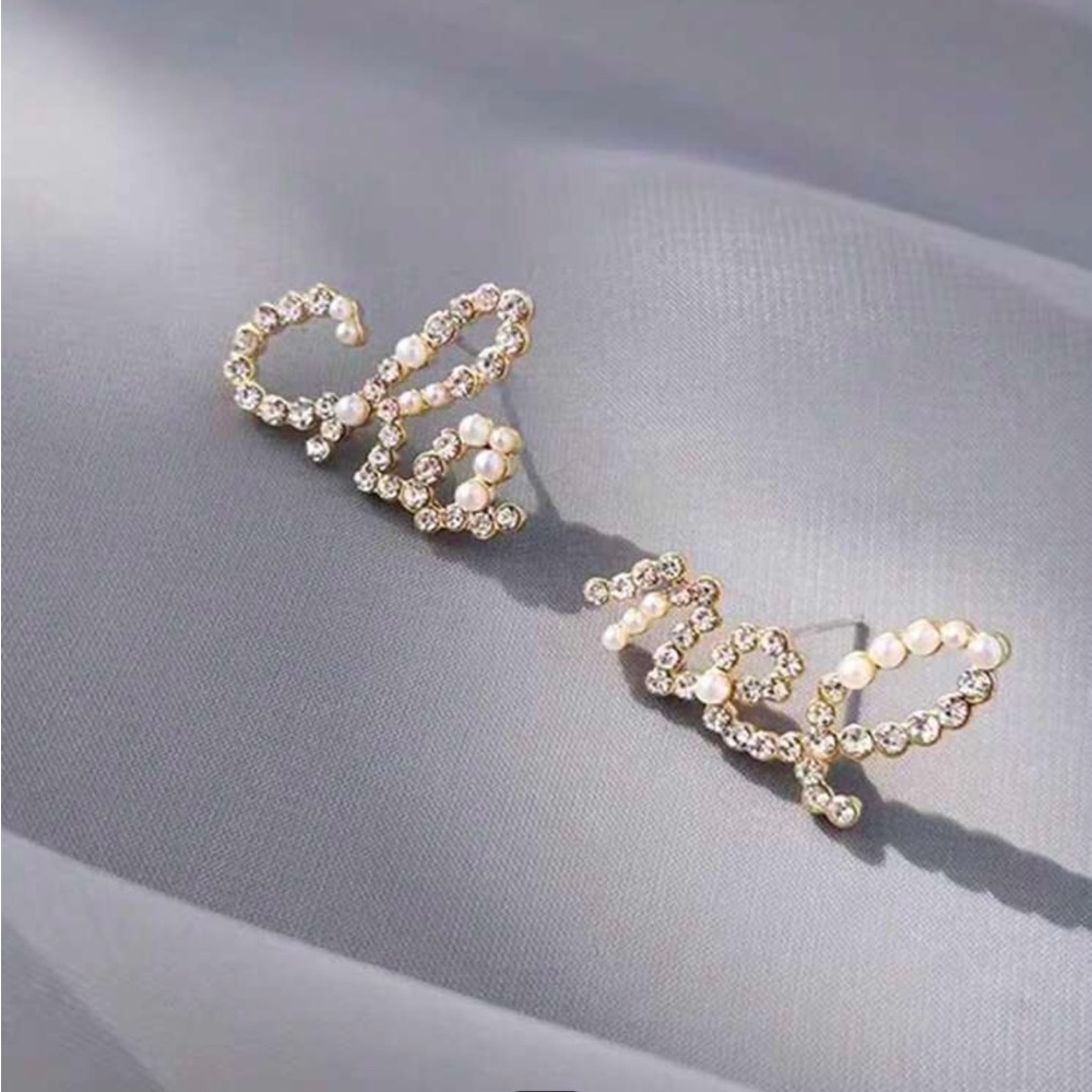 New Cha nel earrings with pearl and rhinestones
